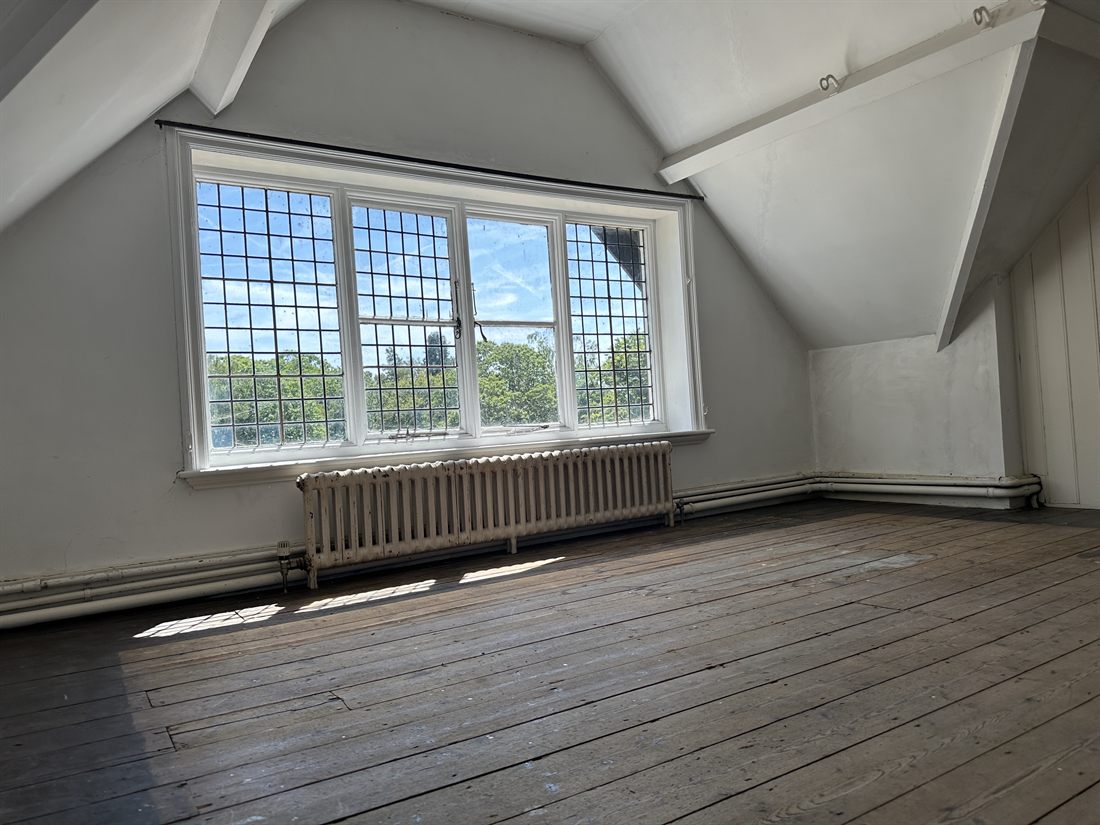Attic room with leaded window