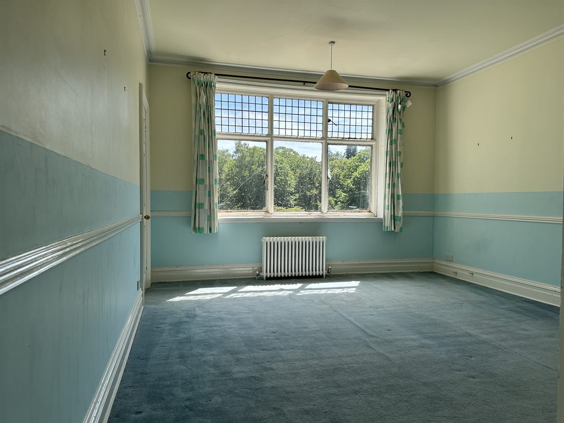 Period bedroom with leaded windows