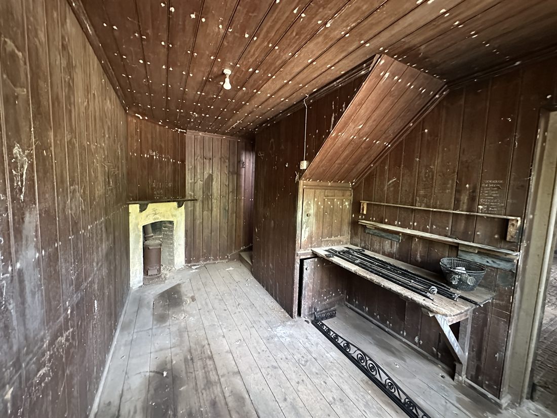 Panelled attic tack room