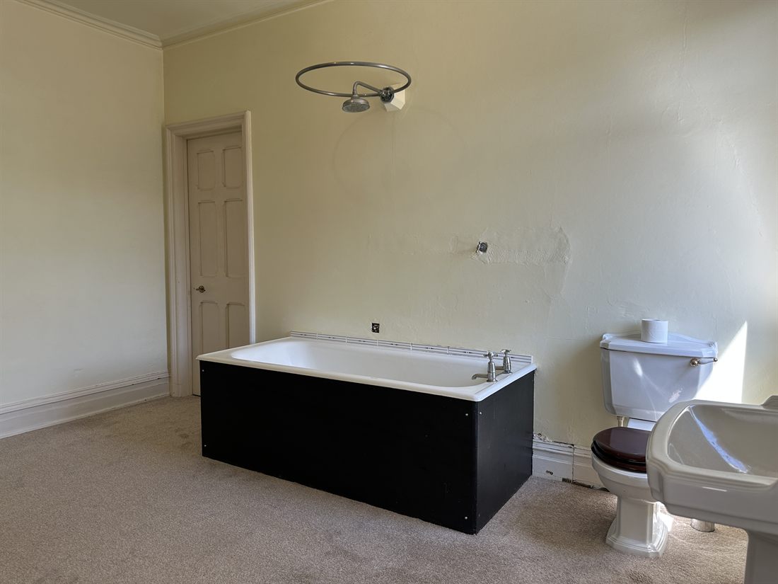 Period bathroom with bath, basin and WC
